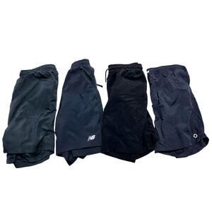 4 Pairs of Black work out shorts size XL and 2XL= all fit similar- 1 New Balance
